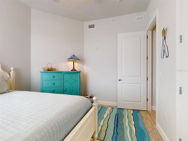 5 Riverwalk Dr Unit 601, New Smyrna Beach, FL 32169 - bedroom with light wood-style flooring and baseboards