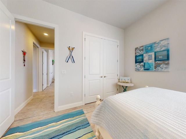 5 Riverwalk Dr Unit 601, New Smyrna Beach, FL 32169 - bedroom featuring a closet, baseboards, and recessed lighting