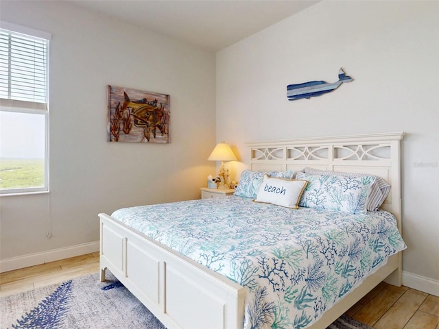 5 Riverwalk Dr Unit 601, New Smyrna Beach, FL 32169 - bedroom with light wood-type flooring and baseboards