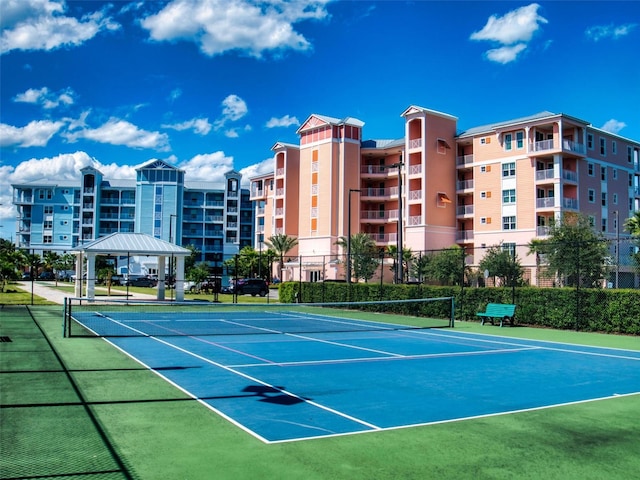 5 Riverwalk Dr Unit 601, New Smyrna Beach, FL 32169 - view of tennis court with fence and a gazebo