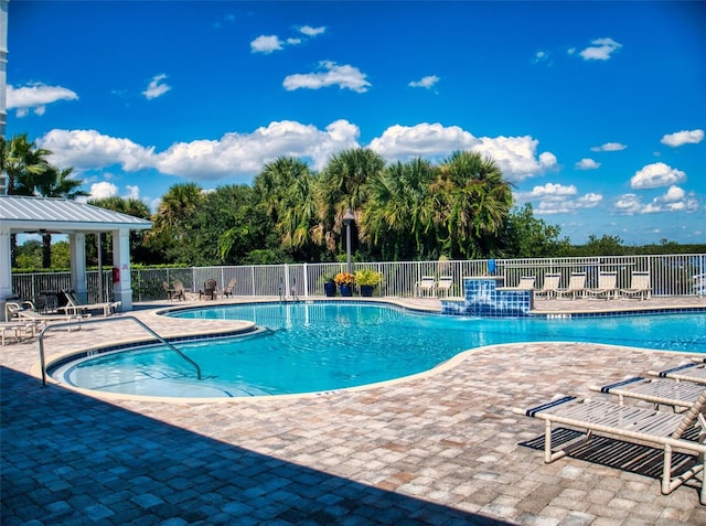 5 Riverwalk Dr Unit 601, New Smyrna Beach, FL 32169 - community pool with fence, a patio, and a gazebo