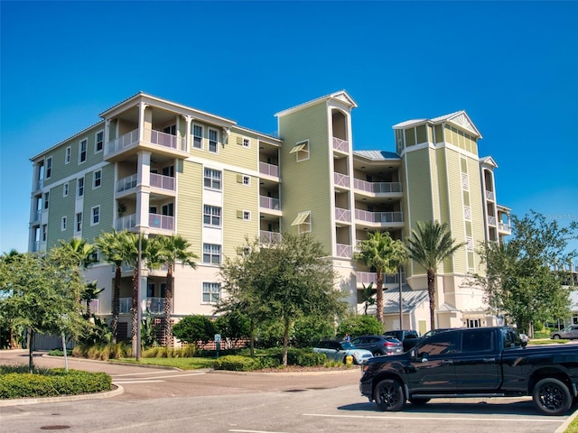 5 Riverwalk Dr Unit 601, New Smyrna Beach, FL 32169 - view of apartment building / complex featuring uncovered parking