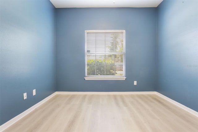 3436 Gerber Daisy Ln, Oviedo, FL 32766 - empty room with baseboards and wood finished floors