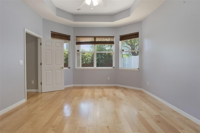3436 Gerber Daisy Ln, Oviedo, FL 32766 - spare room featuring a ceiling fan, baseboards, and light wood finished floors