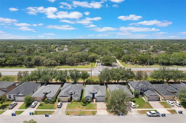 3436 Gerber Daisy Ln, Oviedo, FL 32766 - birds eye view of property featuring a forest view and a residential view