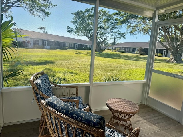 1348 Myerlee Gardens Ave, Fort Myers, FL 33919 - sunroom / solarium with a residential view