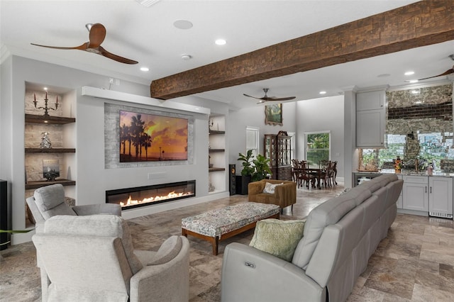 building lobby with recessed lighting and beamed ceiling