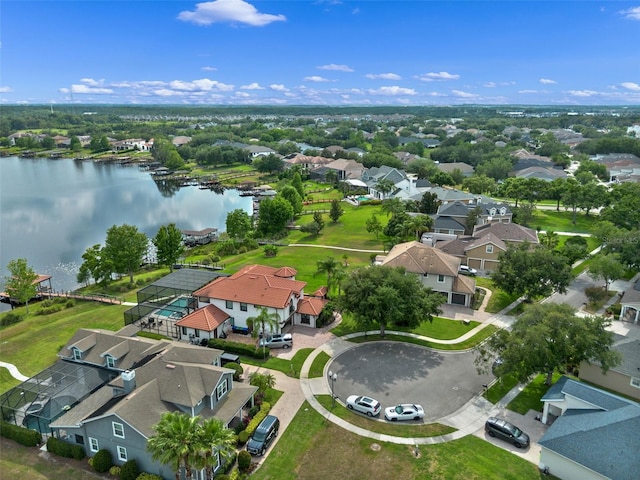 aerial perspective of suburban area with a large body of water