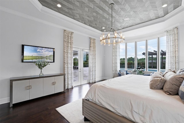 bedroom featuring a tray ceiling, crown molding, access to outside, multiple windows, and recessed lighting