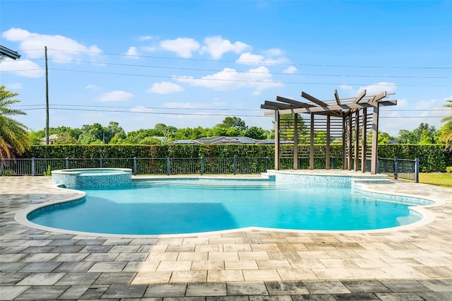 view of swimming pool with a pool with connected hot tub, a pergola, fence, and a patio area