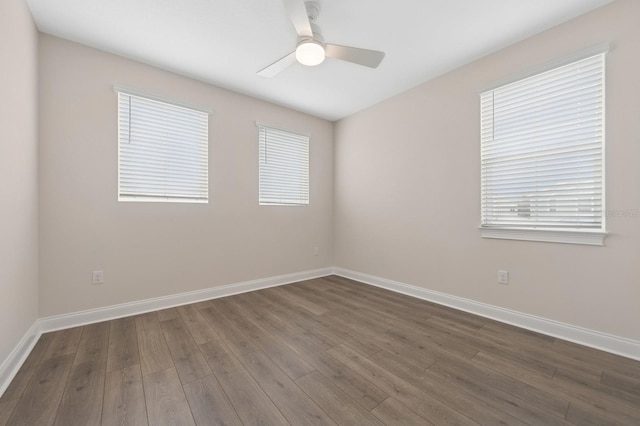 13187 Telsen St Unit 38, Winter Garden, FL 34787 - empty room featuring dark wood finished floors, ceiling fan, and plenty of natural light