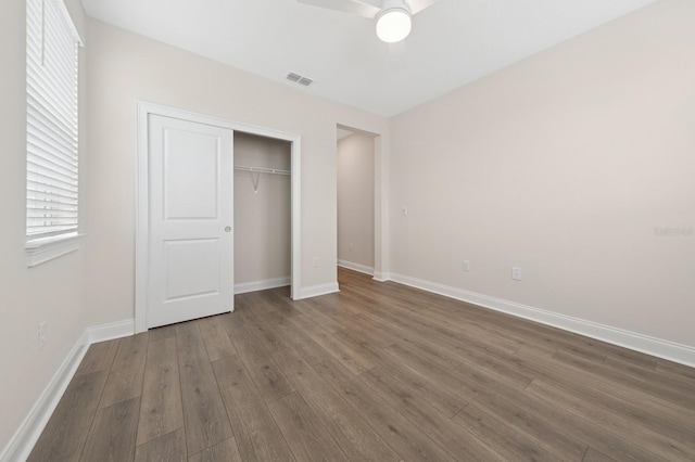 13187 Telsen St Unit 38, Winter Garden, FL 34787 - unfurnished bedroom with dark wood-style floors, a closet, and ceiling fan