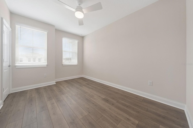 13187 Telsen St Unit 38, Winter Garden, FL 34787 - empty room featuring a ceiling fan and dark wood-type flooring