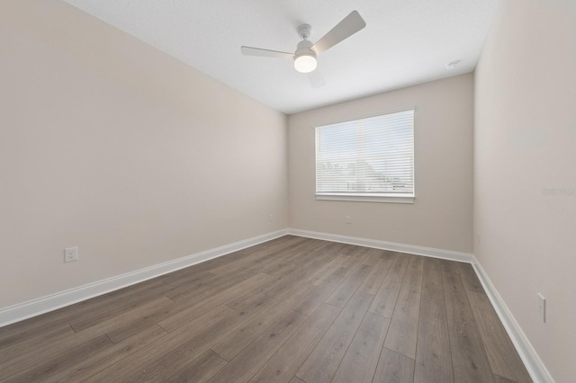 13187 Telsen St Unit 38, Winter Garden, FL 34787 - unfurnished room with ceiling fan and dark wood-style flooring