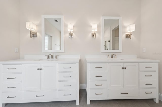 13187 Telsen St Unit 38, Winter Garden, FL 34787 - full bathroom featuring two vanities and tile patterned floors