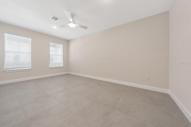 13187 Telsen St Unit 38, Winter Garden, FL 34787 - empty room with ceiling fan and light tile patterned floors
