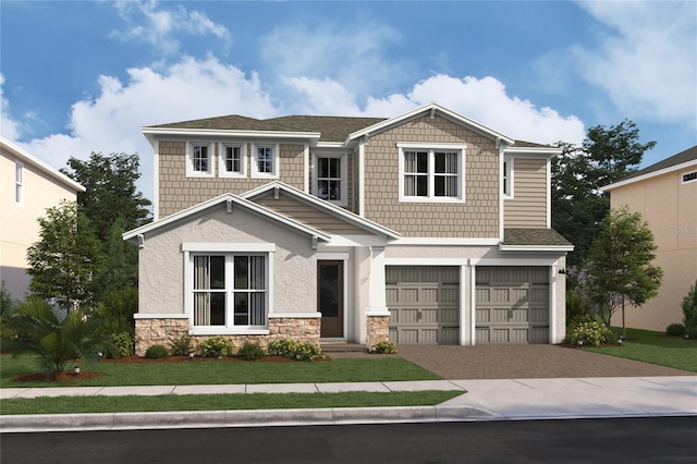 13123 Faro Ct Unit 23, Winter Garden, FL 34787 - view of front of home featuring an attached garage, stone siding, decorative driveway, a shingled roof, and a front lawn