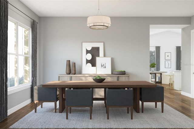 13123 Faro Ct Unit 23, Winter Garden, FL 34787 - dining space featuring wood finished floors and baseboards