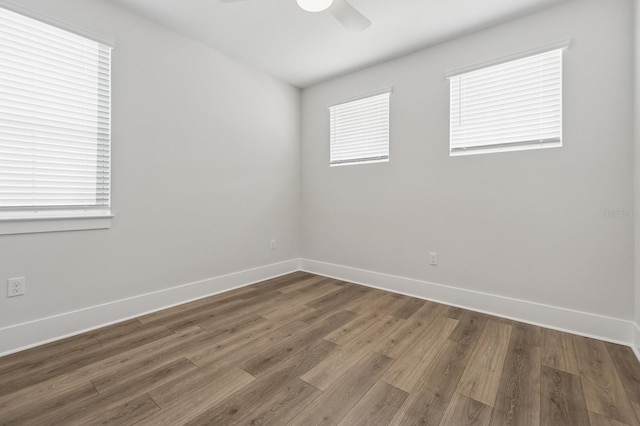 13181 Telsen St Unit 39, Winter Garden, FL 34787 - spare room with ceiling fan, healthy amount of natural light, and wood finished floors