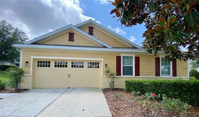 30732 Lipizzan Ter, Mount Dora, FL 32757 - view of front facade featuring concrete driveway and an attached garage