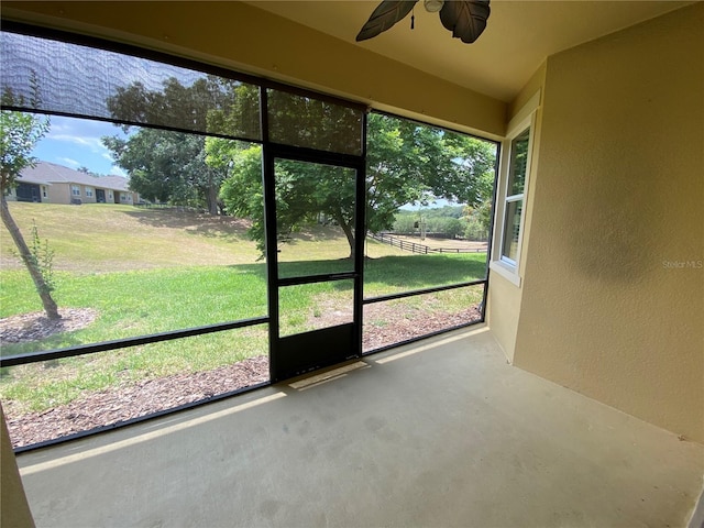 30732 Lipizzan Ter, Mount Dora, FL 32757 - unfurnished sunroom with ceiling fan