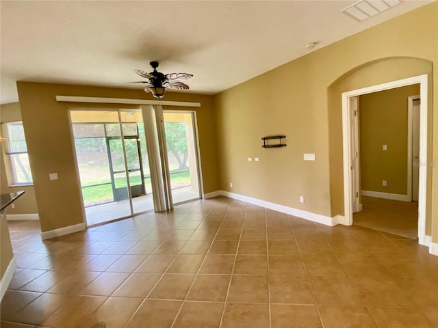 30732 Lipizzan Ter, Mount Dora, FL 32757 - unfurnished room with a ceiling fan, visible vents, baseboards, and light tile patterned flooring