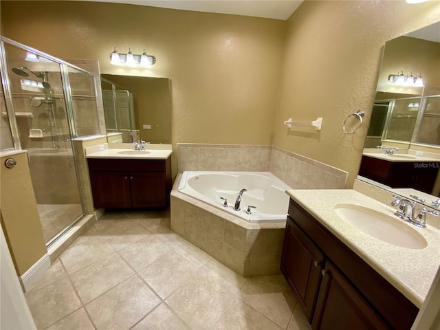 30732 Lipizzan Ter, Mount Dora, FL 32757 - bathroom with a shower stall, tile patterned floors, a garden tub, and a sink