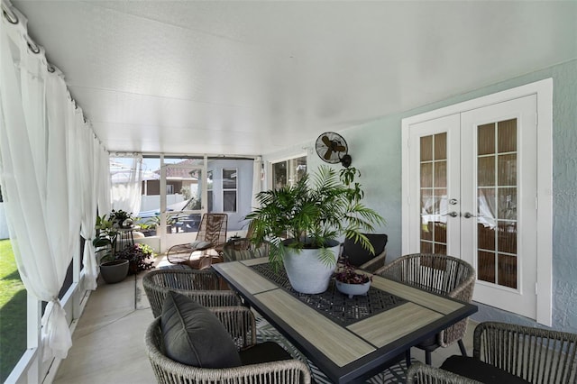 sunroom with french doors and healthy amount of natural light