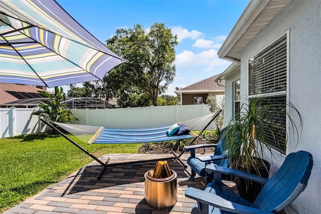 view of patio featuring an outdoor fire pit