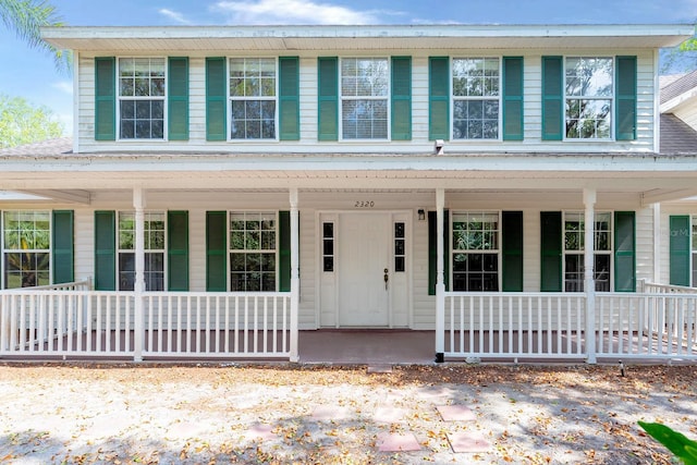2320 Red Ember Rd, Oviedo, FL 32765 - view of front of home featuring a porch