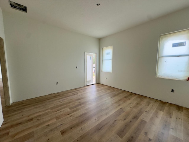 empty room with light wood-type flooring