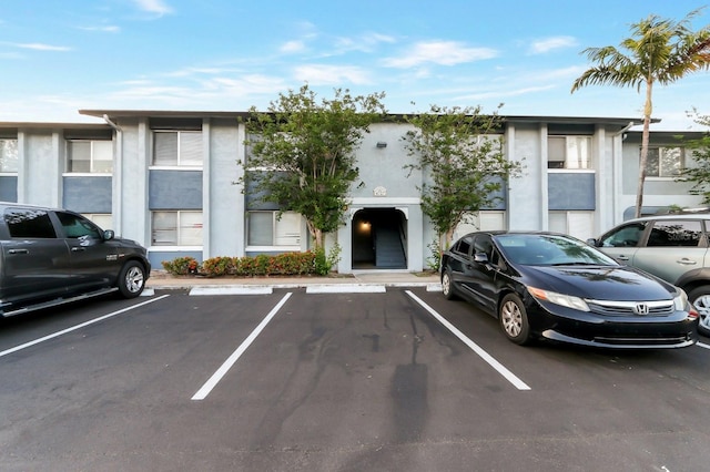 4727 S Texas Ave Unit 4727C, Orlando, FL 32839 - view of building exterior featuring uncovered parking