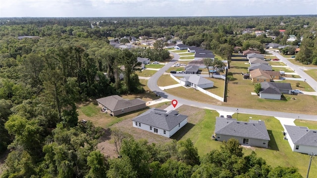 aerial view with a forest view and a residential view
