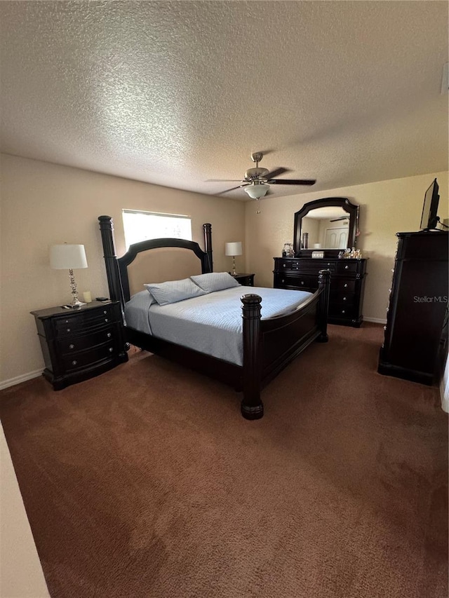 22227 Elmira Blvd, Port Charlotte, FL 33952 - bedroom with dark colored carpet, a textured ceiling, baseboards, and a ceiling fan