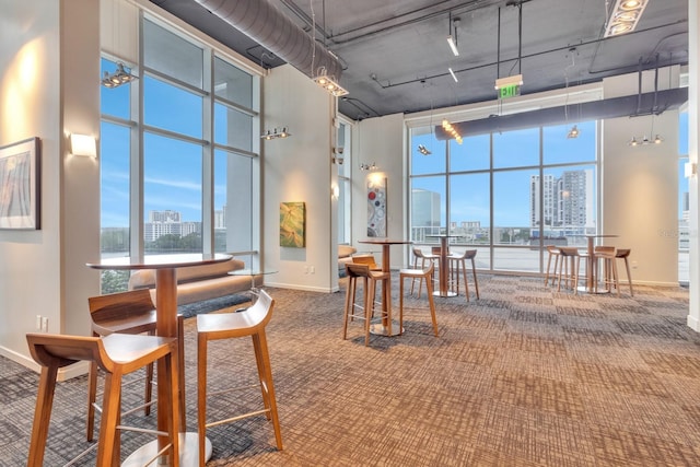 150 E Robinson St Unit 2002, Orlando, FL 32801 - common area featuring a skyline view and a towering ceiling