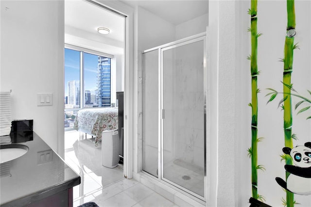 150 E Robinson St Unit 2002, Orlando, FL 32801 - full bath featuring a stall shower, vanity, marble look tile flooring, and a view of city