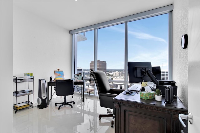 150 E Robinson St Unit 2002, Orlando, FL 32801 - office area featuring healthy amount of natural light, light tile patterned floors, a wall of windows, and a textured wall