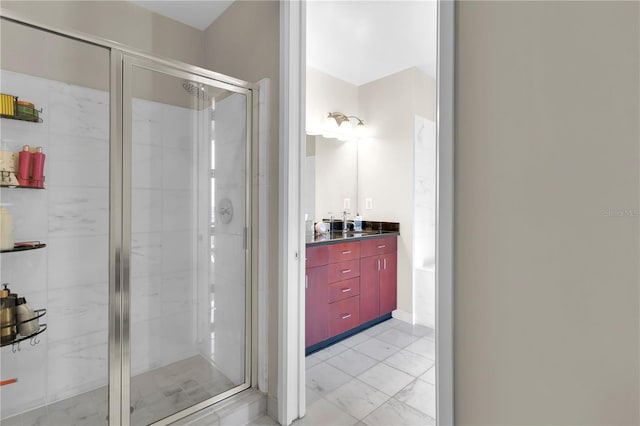 150 E Robinson St Unit 2002, Orlando, FL 32801 - full bath featuring marble look tiles, a stall shower, and vanity
