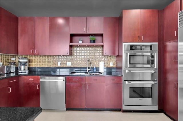 150 E Robinson St Unit 2002, Orlando, FL 32801 - kitchen with stainless steel appliances, a sink, a warming drawer, decorative backsplash, and open shelves