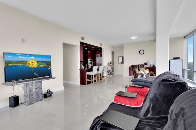 150 E Robinson St Unit 2002, Orlando, FL 32801 - tiled living area with baseboards