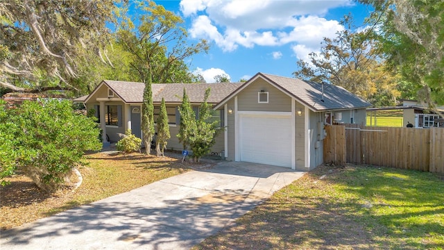 2927 Ahern Dr, Orlando, FL 32817 - ranch-style house with fence, a garage, a front lawn, and concrete driveway