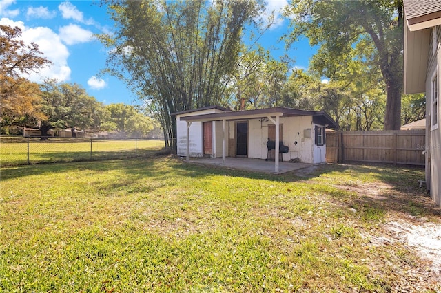 2927 Ahern Dr, Orlando, FL 32817 - view of outdoor structure featuring a fenced backyard