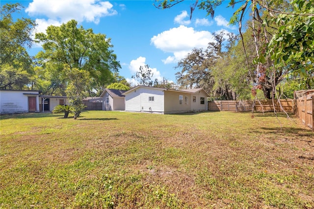 2927 Ahern Dr, Orlando, FL 32817 - view of yard featuring a fenced backyard