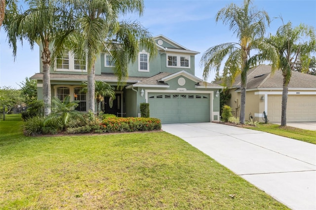 2842 Balforn Tower, Winter Garden, FL 34787 - view of front of property with concrete driveway, an attached garage, stucco siding, and a front yard