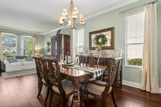 2842 Balforn Tower, Winter Garden, FL 34787 - dining area featuring crown molding, a notable chandelier, baseboards, and dark wood finished floors