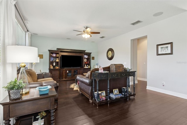 2842 Balforn Tower, Winter Garden, FL 34787 - living area with baseboards, visible vents, wood finished floors, and a ceiling fan