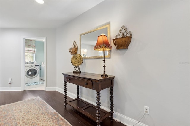2842 Balforn Tower, Winter Garden, FL 34787 - entrance foyer featuring separate washer and dryer, wood finished floors, and baseboards