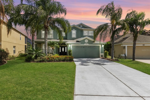 2842 Balforn Tower, Winter Garden, FL 34787 - mediterranean / spanish-style home featuring stucco siding, concrete driveway, and a lawn