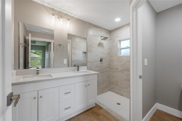 274 W Bolero Pl, Citrus Springs, FL 34434 - bathroom featuring double vanity, walk in shower, and wood finished floors