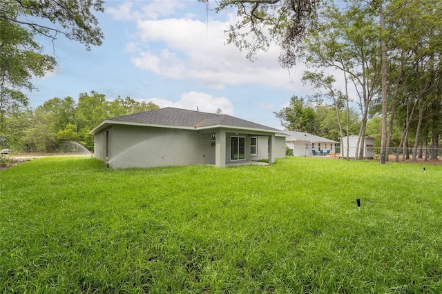 274 W Bolero Pl, Citrus Springs, FL 34434 - back of house featuring stucco siding